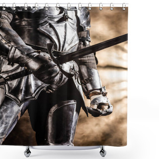 Personality  Cropped View Of Knight In Armor Holding Sword On Black Background Shower Curtains