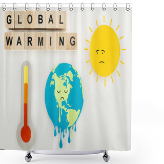 Personality  Paper Cuts Melting Earth And Sun With Sad Face Expressions, Thermometer, And Wooden Cubes With 