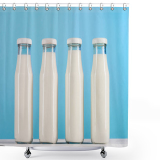 Personality  Row Of Glass Bottles With Milk On Tabletop Shower Curtains