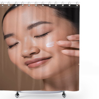 Personality  Close Up View Of Pretty Asian Woman Applying Face Cream And Closing Eyes Isolated On Brown  Shower Curtains