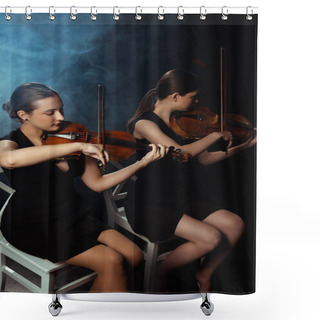 Personality  Attractive Professional Musicians Playing On Violins On Dark Stage With Smoke Shower Curtains