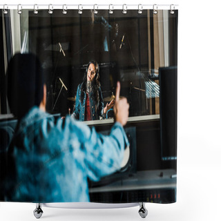 Personality  Selective Focus Of Mixed Race Sound Producer Showing Thumb Up To Woman Singing In Recording Studio Shower Curtains