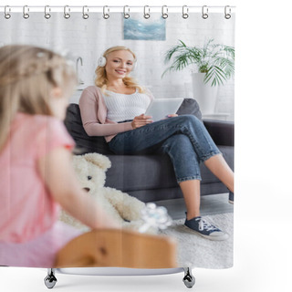Personality  Happy Woman Looking At Blurred Daughter While Sitting On Sofa In Headphones Shower Curtains