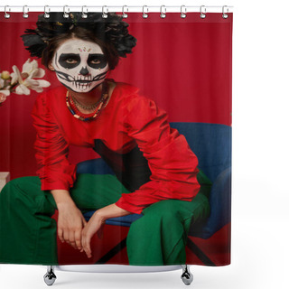 Personality  Woman In Dia De Los Muertos Makeup Sitting In Armchair Near Flowers And Looking At Camera On Red Shower Curtains