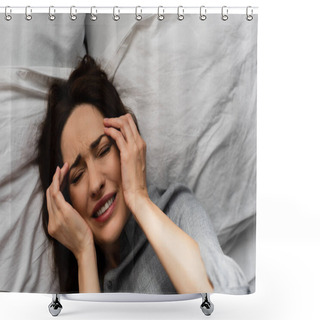 Personality  Top View Of Brunette Woman Suffering From Pain And Touching Head While Lying On Bed  Shower Curtains