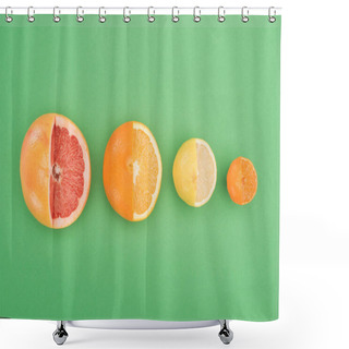 Personality  Top View Of Fresh Partially Cut Grapefruit, Orange, Lemon And Tangerine On Green Background Shower Curtains