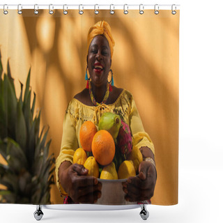 Personality  Smiling Middle Aged African American Woman Holding Metal Bowl With Fruits On Orange Shower Curtains