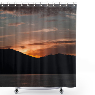 Personality  Beautiful Sunset Over Silhouette Of Hills And Water Surface Shower Curtains