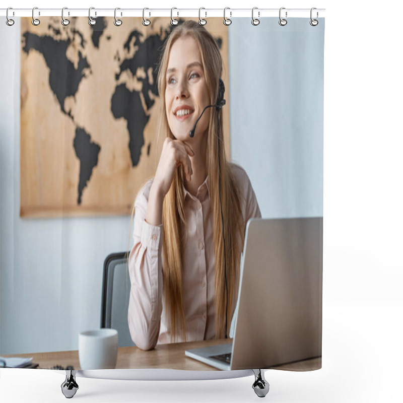 Personality  smiling travel agent looking away while sitting at workplace shower curtains