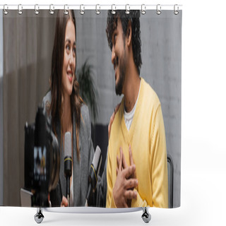 Personality  Honest And Bearded Indian Man Touching Chest And Talking To Charming Brunette Colleague Near Microphones And Blurred Digital Camera In Radio Studio, Banner Shower Curtains