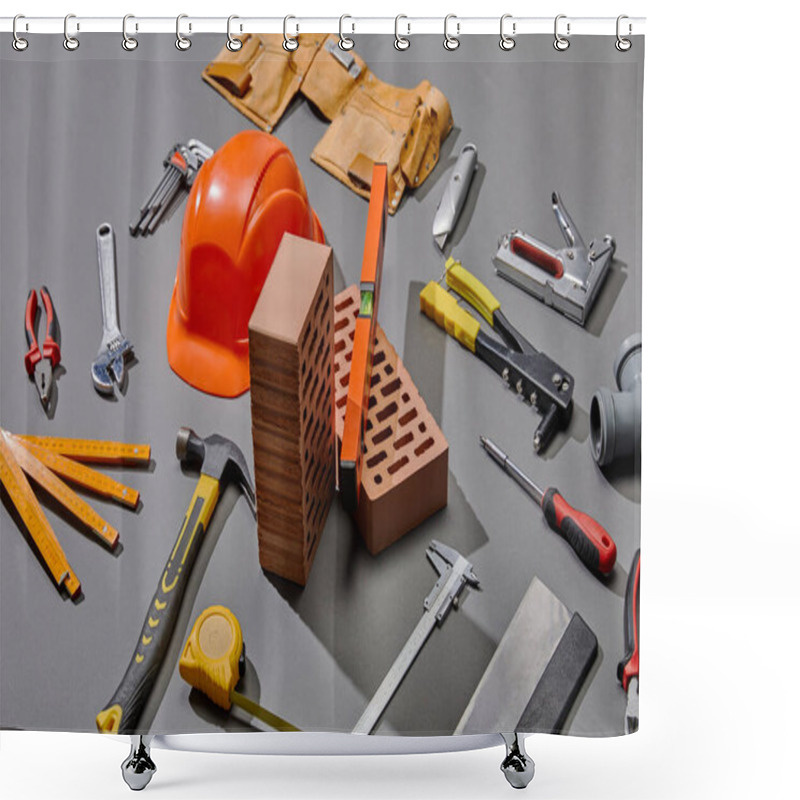 Personality  high angle view of helmet, bricks and industrial tools on grey background shower curtains