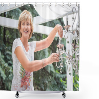 Personality  Senior Woman Changing A Light Bulb In A Chandelier Shower Curtains
