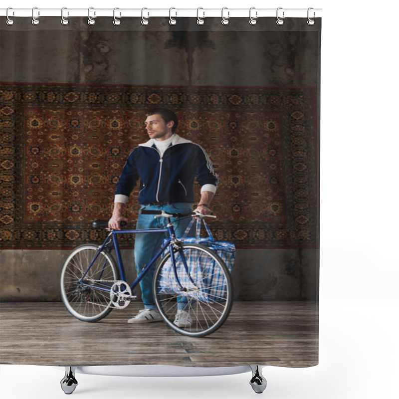 Personality  Handsome Young Man In Vintage Clothes With Road Bike And Bag In Front Of Rug Hanging On Wall Shower Curtains