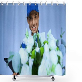 Personality  Happy Delivery Man Holding Fresh Flowers On Blurred Foreground Isolated On Blue Shower Curtains