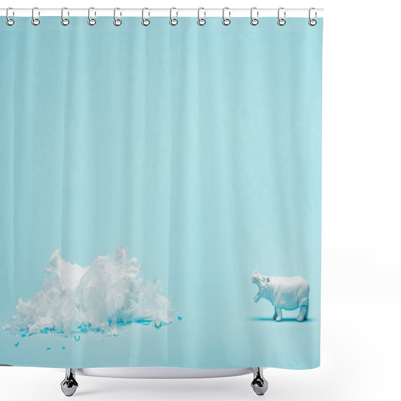 Personality  White hippopotamus toy and plastic garbage on blue background, animal welfare concept shower curtains