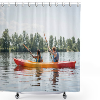Personality  Side View Of Active Multiethnic Couple In Life Vests Holding Paddles While Sailing In Sportive Kayak On River With Picturesque Bank With Green Trees In Summer Shower Curtains