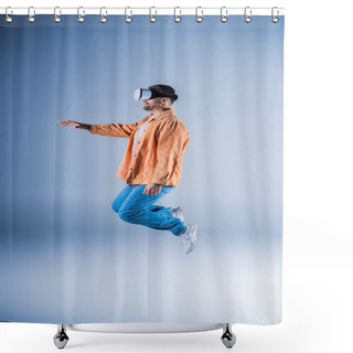 Personality  A Man In An Orange Jacket And Blue Pants Is Soaring Through The Air. Shower Curtains