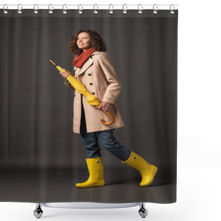 Personality  Cheerful Woman In Trench Coat And Rubber Boots Holding Yellow Umbrella On Black Background Shower Curtains