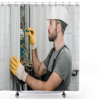 Personality  Side View Of Handsome Bearded Electrician Repairing Electrical Box And Using Screwdriver In Corridor Shower Curtains