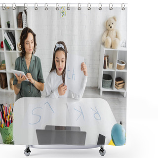 Personality  Smiling Woman Using Digital Tablet Near Daughter Holding Paper With Letters Th During Speech Therapy Online Lesson At Home  Shower Curtains