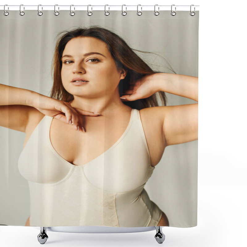 Personality  Portrait Of Brunette Curvy Woman With Plus Size Body Posing In Beige Bodysuit While Standing And Touching Hair In Studio On Grey Background, Body Positive, Figure Type, Looking At Camera  Shower Curtains