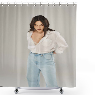 Personality  A Beautiful Plus Size Woman Poses Confidently In A Stylish White Shirt And Blue Jeans Against A Gray Backdrop. Shower Curtains