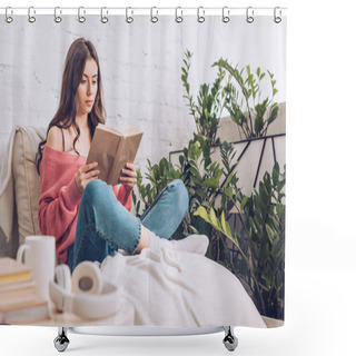 Personality  Selective Focus Of Focused Young Woman Reading Book While Sitting With Crossed Legs Near Green Plants At Home Shower Curtains