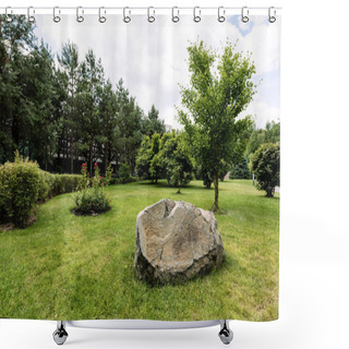 Personality  Huge Stone On Green And Fresh Grass Near Trees In Park  Shower Curtains