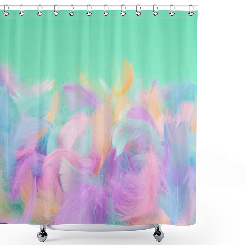 Personality  Colorful feather on mint background, top view.  shower curtains