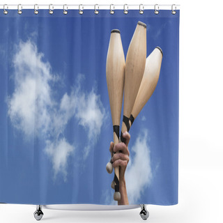 Personality  Man's Hand Holding Three Wooden Juggling Clubs In The Blue Sky Shower Curtains