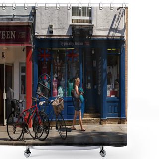 Personality  Woman Walks Past A Gift Shop And Parked Bicycles In The Streets In Cambridge Shower Curtains