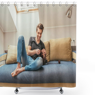 Personality  Happy Young Man Knitting While Sitting On Sofa At Home In Attic Room Shower Curtains