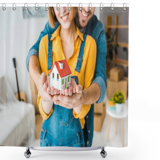 Personality  Cropped View Of Smiling Couple Holding Toy House And Looking At Camera At Home Shower Curtains