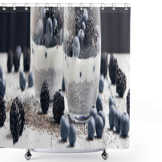 Personality  Panoramic Shot Of Yogurt With Chia Seeds And Berries In Glasses Near Scattered Seeds, Blueberries And Blackberries On White Table Isolated On Black Shower Curtains