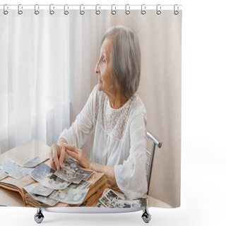 Personality  Mature Woman Watching Black And White Old Photo Album At Home.Person Looking At Her Own Photo Was Taken In 1963, 1965. She Has Got Smile While Remembering How Young She Was And Looking At The Window. Shower Curtains