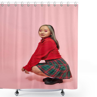Personality  Full Length Of Young Asian Woman With Heart Shaped Eye Makeup And Plaid Skirt Sitting On Pink Shower Curtains