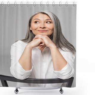 Personality  Positive Pensive Asian Woman With Grey Hair Sitting On Chair Isolated On Grey Shower Curtains