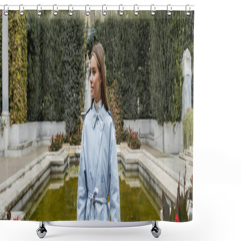 Personality  Young Woman In Blue Trench Coat Standing Near Fountain With Green Water In Park, Banner  Shower Curtains