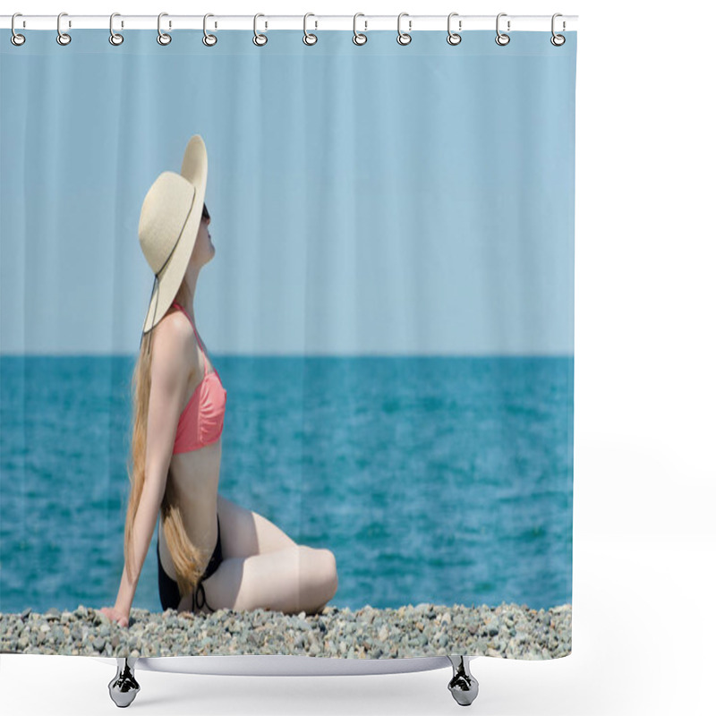 Personality  Beautiful girl in a swimsuit and hat sits on a beach on a background of the sea shower curtains