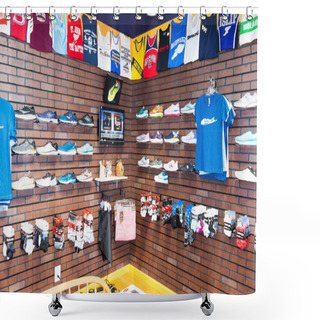 Personality  Smithtown, New York, USA - 28 August 2020: Running Shoes Are On Display With Clothing And Uniform Tops Hanging On The Wall At A Local Running Shoe Store. Shower Curtains