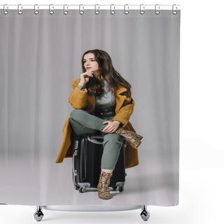 Personality  Beautiful Pensive Woman In Beige Coat Sitting On Travel Bag On Grey Shower Curtains