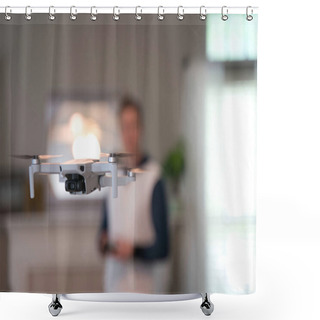 Personality  Drone Flying Indoors With Pilot Visible In Background. Amateur Drone Flight. User Wearing Sweatshirt Flying Drone Inside Of Home On Cold Day. White Drone Flying Inside. Shower Curtains