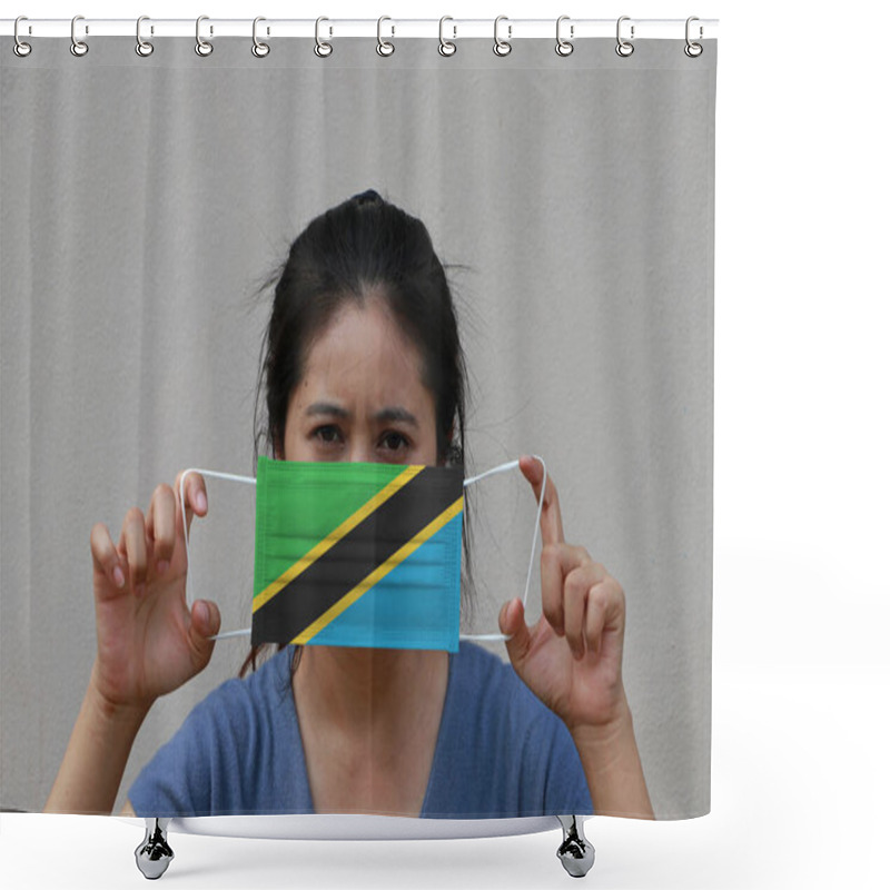 Personality  A Woman With Tanzania Flag On Hygienic Mask In Her Hand And Lifted Up The Front Face On Beige Color Background. Tiny Particle Or Virus Corona Or Covid 19 Protection. Concept Of Combating Illness. Shower Curtains