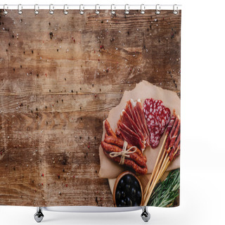 Personality  Top View Of Round Cutting Board With Delicious Prosciutto, Salami, Smoked Sausages, Olives And Herbs On Wooden Vintage Table With Scattered Peppercorns Shower Curtains
