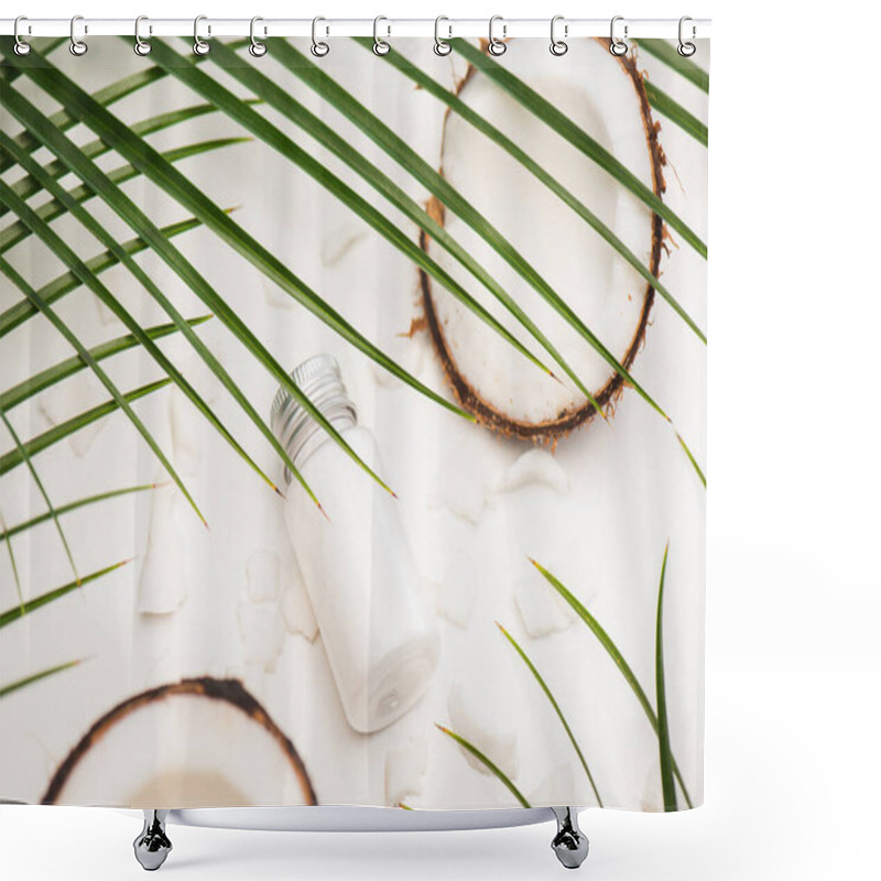 Personality  coconut halves, flakes and homemade lotion under palm leaves on white surface shower curtains