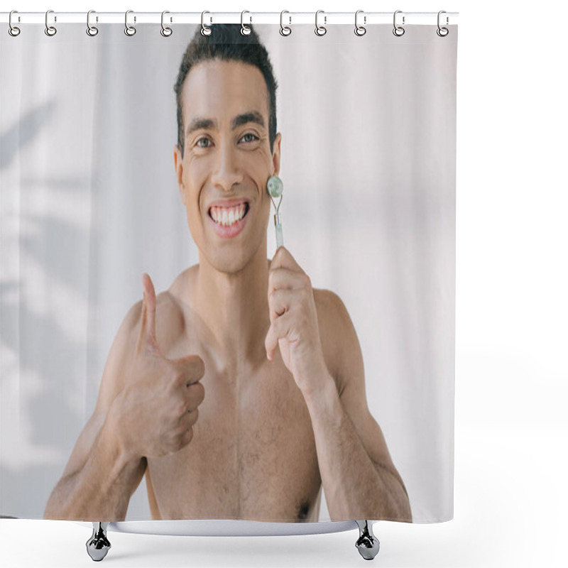 Personality  Handsome Mixed Race Man Massaging Face With Jade Roller And Showing Thumb Up While Looking At Camera Shower Curtains