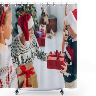 Personality  Selective Focus Of Senior Man In Santa Hat Taking Christmas Presents From Grandchildren Shower Curtains