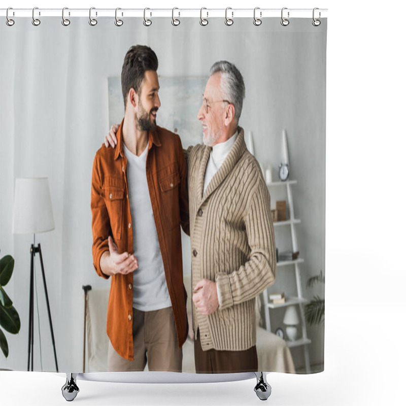 Personality  handsome man gesturing and looking at cheerful senior father  shower curtains