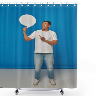 Personality  Excited African American Man In Denim Jeans Pointing At Speech Bubble On Blue Backdrop, Full Length Shower Curtains