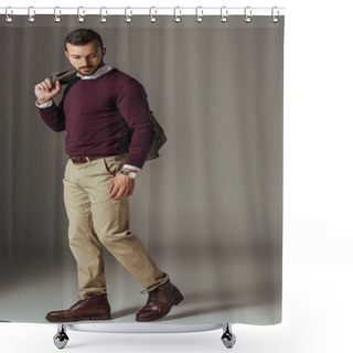 Personality  Fashionable Man Posing In Beige Pants And Burgundy Sweater With Autumn Jacket On Shoulder, On Grey Shower Curtains